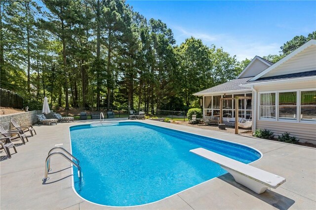 308 Amethyst Way, Seneca, SC 29672 - view of swimming pool with a diving board, a sunroom, and a patio area