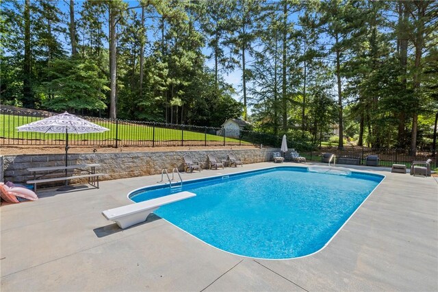 308 Amethyst Way, Seneca, SC 29672 - view of pool featuring a patio area, a fenced backyard, a diving board, and view of wooded area