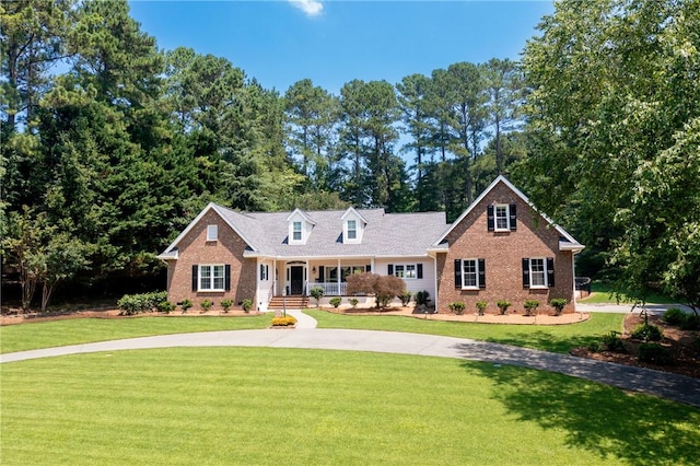 308 Amethyst Way, Seneca, SC 29672 - view of front of house featuring a porch, brick siding, and a front yard