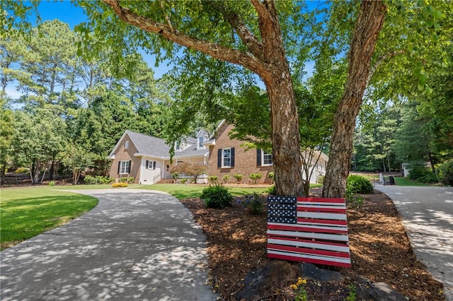 308 Amethyst Way, Seneca, SC 29672 - view of front of property featuring a front lawn, curved driveway, and brick siding