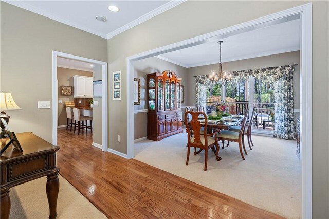308 Amethyst Way, Seneca, SC 29672 - dining room featuring a chandelier, crown molding, light wood-style floors, and recessed lighting