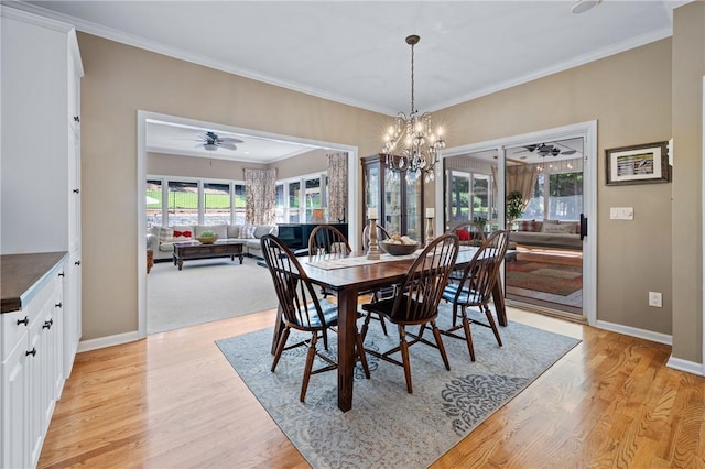 308 Amethyst Way, Seneca, SC 29672 - dining space with light wood-type flooring, ornamental molding, a chandelier, and ceiling fan