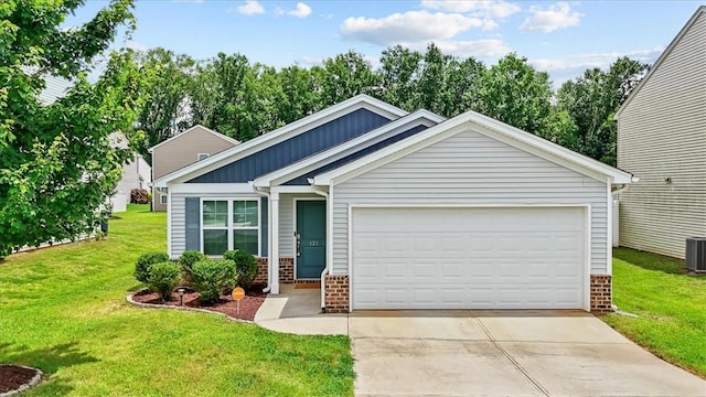 121 Traditions Blvd, Anderson, SC 29625 - view of front of property with brick siding, a front yard, an attached garage, and driveway