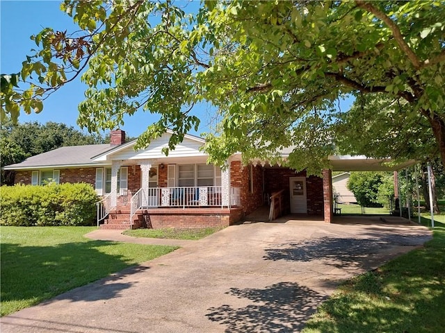202 Ashley Ave, Anderson, SC 29624 - view of front of home with a porch, brick siding, a chimney, a front yard, and an attached carport