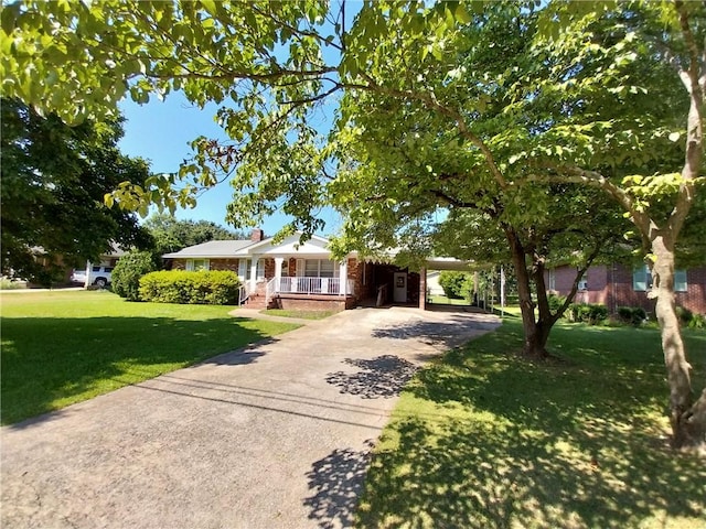 202 Ashley Ave, Anderson, SC 29624 - view of front of house with covered porch, brick siding, a front yard, driveway, and a carport