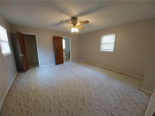202 Ashley Ave, Anderson, SC 29624 - unfurnished bedroom with multiple windows and ceiling fan
