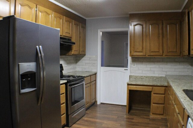 204 Payne Ln, Clemson, SC 29631 - kitchen with appliances with stainless steel finishes, ornamental molding, tasteful backsplash, dark wood-style flooring, and range hood