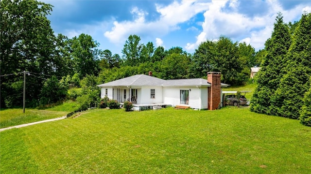 7703 Moorefield Memorial Hwy, Liberty, SC 29657 - view of front facade featuring a front yard and a chimney