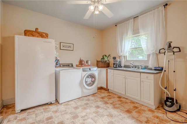 251 W Mcelhaney Rd, Taylors, SC 29687 - laundry room with separate washer and dryer, stone finish flooring, a ceiling fan, and cabinet space