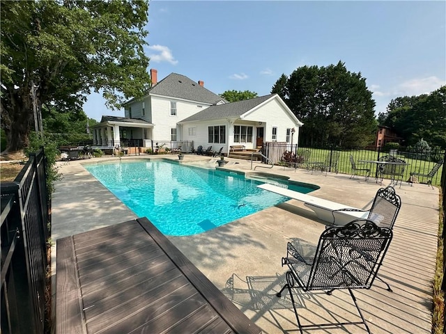 251 W Mcelhaney Rd, Taylors, SC 29687 - view of swimming pool featuring a patio area and a diving board