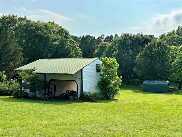 251 W Mcelhaney Rd, Taylors, SC 29687 - view of outbuilding with a view of trees