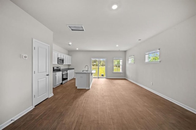 108 Lowland Dr, Anderson, SC 29621 - unfurnished living room featuring dark wood-type flooring and recessed lighting