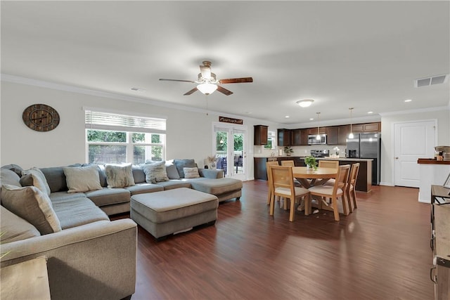 220 Celebration Ave, Anderson, SC 29625 - living area featuring a ceiling fan, dark wood-style flooring, crown molding, and recessed lighting