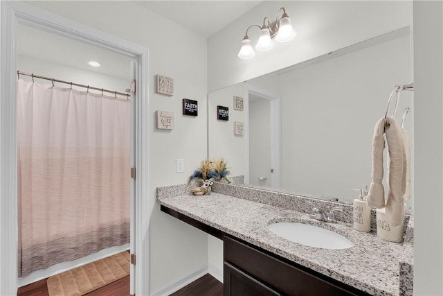 220 Celebration Ave, Anderson, SC 29625 - full bathroom featuring vanity, wood finished floors, and curtained shower