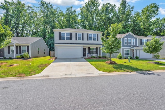 220 Celebration Ave, Anderson, SC 29625 - traditional home featuring concrete driveway, an attached garage, and a front yard