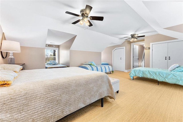 1047 Tranquility Ln, Hartwell, GA 30643 - bedroom featuring light colored carpet, vaulted ceiling, and ceiling fan
