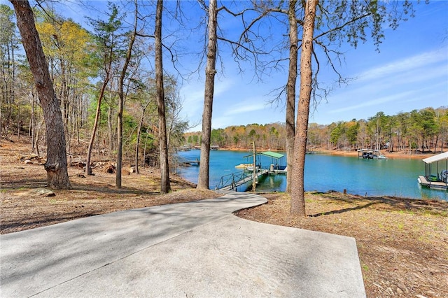 1047 Tranquility Ln, Hartwell, GA 30643 - water view featuring a floating dock and a forest