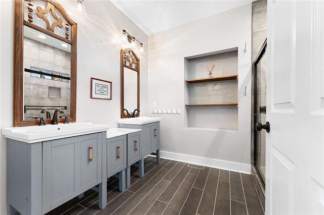 1047 Tranquility Ln, Hartwell, GA 30643 - bathroom with double vanity, wood tiled floors, and a shower