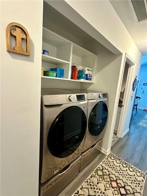 118 Branch St, Walhalla, SC 29691 - washroom featuring washer and clothes dryer and wood finished floors