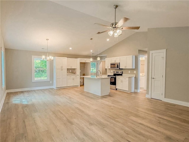 330 Code Cir, Seneca, SC 29678 - kitchen featuring appliances with stainless steel finishes, open floor plan, white cabinetry, high vaulted ceiling, and recessed lighting