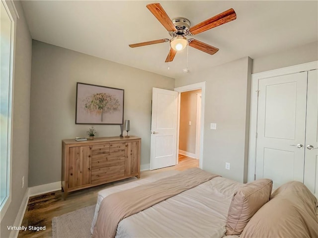 330 Code Cir, Seneca, SC 29678 - bedroom with light wood-style floors and ceiling fan