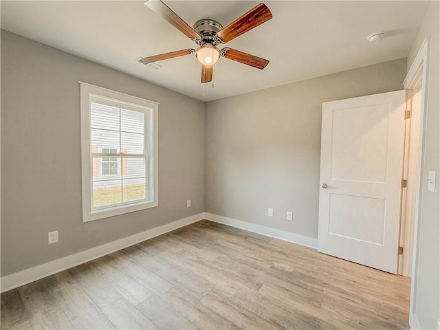 330 Code Cir, Seneca, SC 29678 - empty room with light wood finished floors, a ceiling fan, and a smoke detector