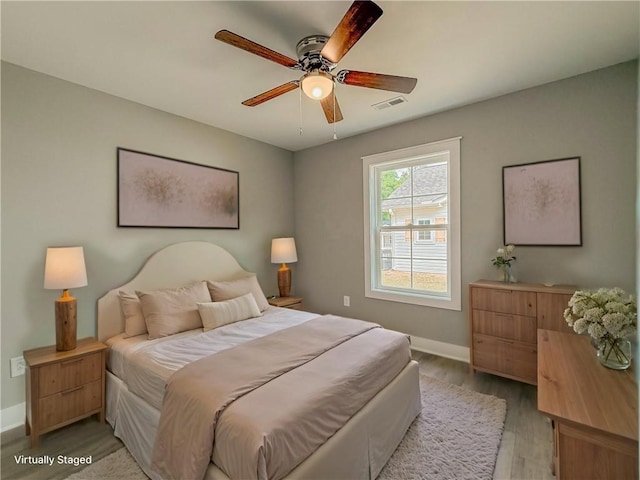 330 Code Cir, Seneca, SC 29678 - bedroom with light wood finished floors and ceiling fan