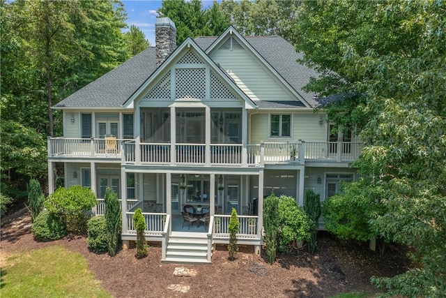 120 Links View Ct, Sunset, SC 29685 - rear view of house featuring a shingled roof and a chimney