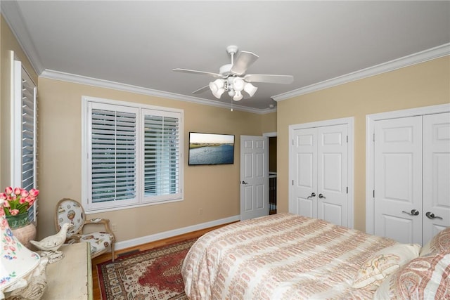 120 Links View Ct, Sunset, SC 29685 - bedroom featuring wood finished floors, multiple closets, ornamental molding, and a ceiling fan