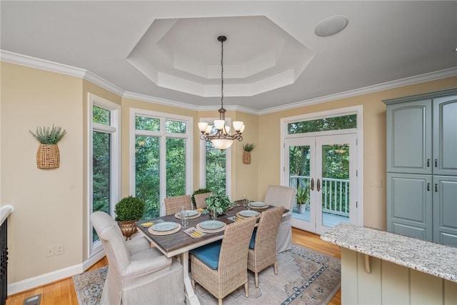 120 Links View Ct, Sunset, SC 29685 - dining space featuring french doors, a tray ceiling, light wood-style floors, a chandelier, and crown molding
