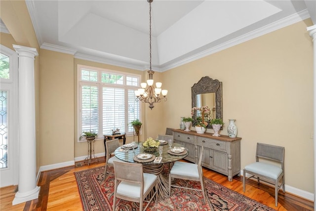 120 Links View Ct, Sunset, SC 29685 - dining space with ornate columns, a chandelier, light wood-style flooring, a tray ceiling, and crown molding