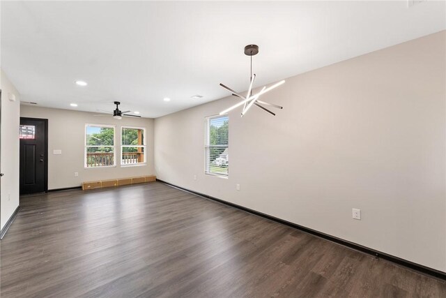 108 Hunter St, Anderson, SC 29625 - empty room featuring wood finished floors, recessed lighting, ceiling fan, and a chandelier