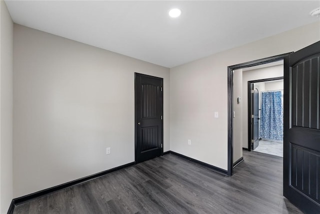 108 Hunter St, Anderson, SC 29625 - empty room featuring dark wood-style floors, recessed lighting, and a smoke detector