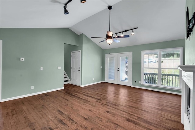 210 Briarcliff Rd, Central, SC 29630 - unfurnished living room with track lighting, lofted ceiling, a ceiling fan, wood finished floors, and a fireplace