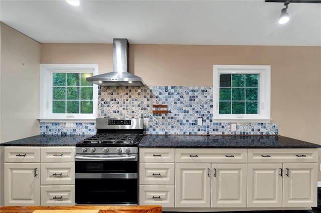 210 Briarcliff Rd, Central, SC 29630 - kitchen featuring wall chimney range hood, stainless steel gas range oven, white cabinets, and decorative backsplash