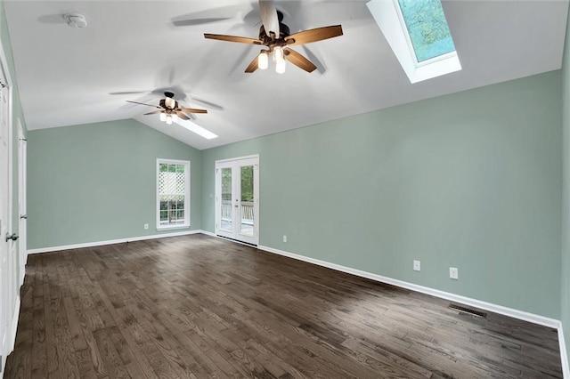 210 Briarcliff Rd, Central, SC 29630 - unfurnished room featuring a skylight, vaulted ceiling, a ceiling fan, dark wood-type flooring, and french doors