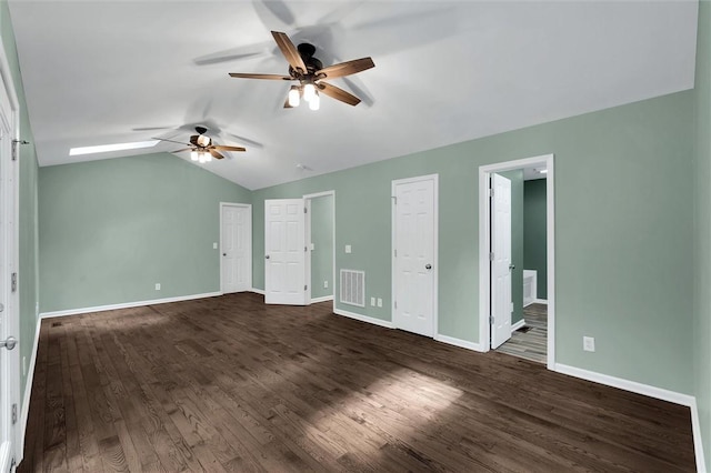 210 Briarcliff Rd, Central, SC 29630 - unfurnished bedroom featuring dark wood-type flooring, lofted ceiling, multiple closets, ensuite bath, and ceiling fan