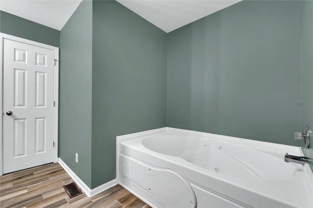 210 Briarcliff Rd, Central, SC 29630 - full bath with a tub with jets and wood finished floors