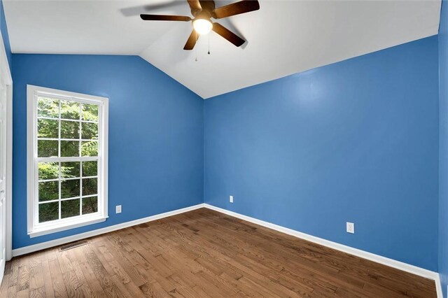210 Briarcliff Rd, Central, SC 29630 - empty room featuring ceiling fan, vaulted ceiling, and wood finished floors