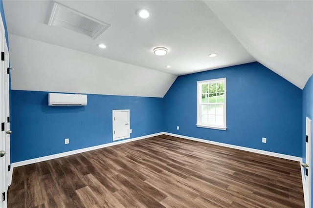 210 Briarcliff Rd, Central, SC 29630 - additional living space featuring an AC wall unit, dark wood finished floors, attic access, and vaulted ceiling