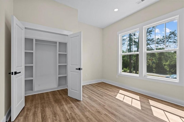 711 Concord Rd, Anderson, SC 29621 - unfurnished bedroom featuring wood finished floors and recessed lighting