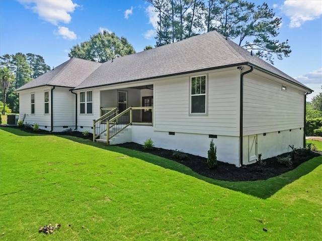 711 Concord Rd, Anderson, SC 29621 - back of property featuring crawl space, a yard, and a shingled roof