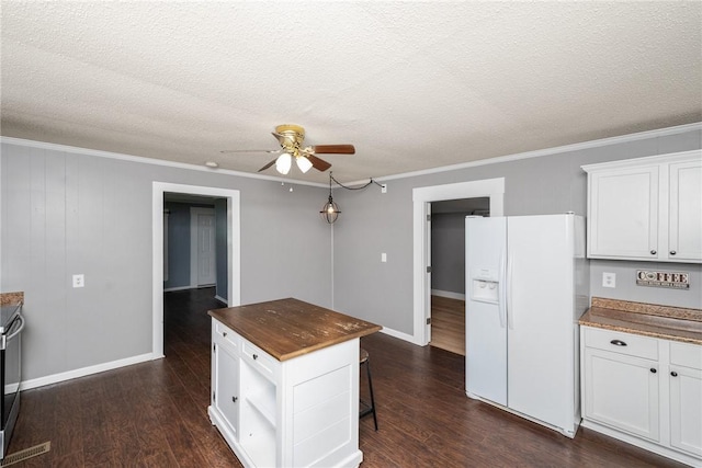 200 Maplecroft St, Liberty, SC 29657 - kitchen featuring white refrigerator with ice dispenser, ceiling fan, wooden counters, ornamental molding, and white cabinets
