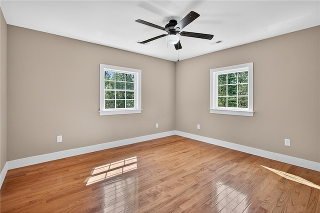 323 Indian Trl, Salem, SC 29676 - empty room featuring plenty of natural light, hardwood / wood-style floors, and a ceiling fan