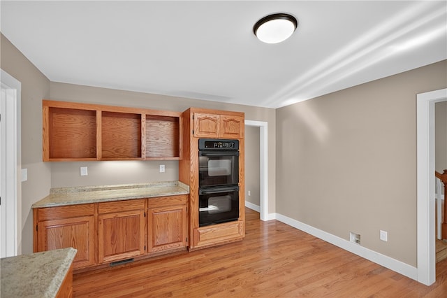 323 Indian Trl, Salem, SC 29676 - kitchen with light wood-type flooring and light stone counters