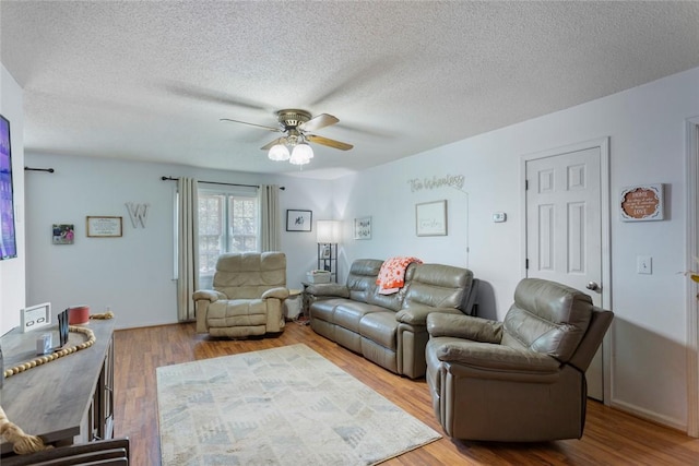 123 Radisson Rd, Seneca, SC 29678 - living area featuring a ceiling fan, a textured ceiling, and wood finished floors
