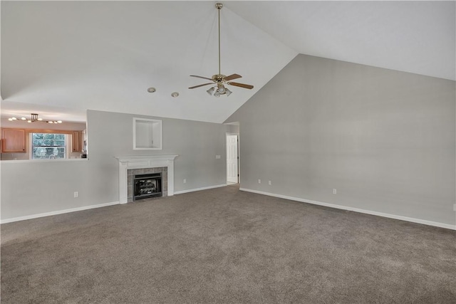 208 Playground Rd, Walhalla, SC 29691 - unfurnished living room with a ceiling fan, a tiled fireplace, dark carpet, and high vaulted ceiling