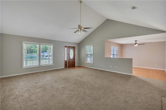 208 Playground Rd, Walhalla, SC 29691 - unfurnished living room with ceiling fan, carpet floors, and high vaulted ceiling