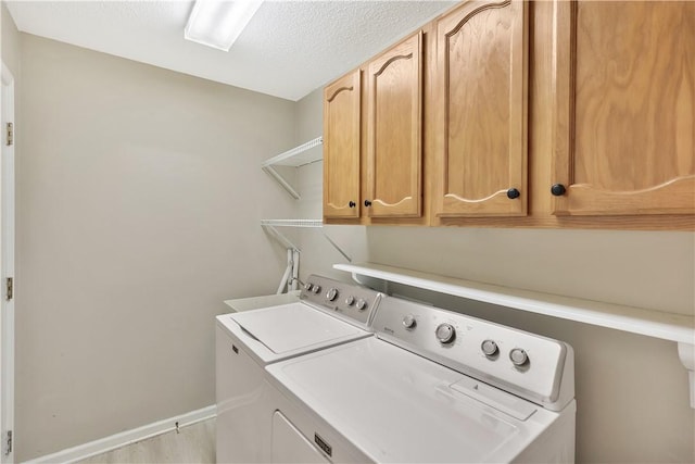 208 Playground Rd, Walhalla, SC 29691 - laundry room with cabinet space, separate washer and dryer, and wood finished floors