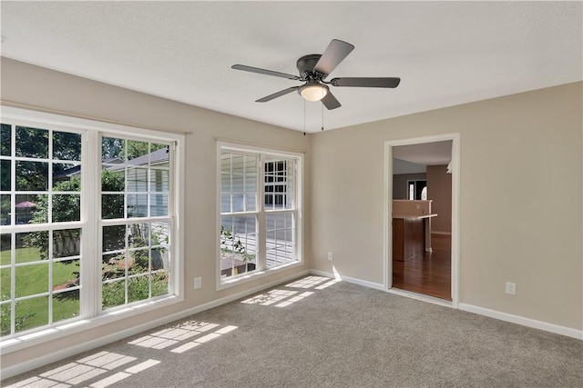 208 Playground Rd, Walhalla, SC 29691 - empty room with carpet floors, plenty of natural light, and a ceiling fan